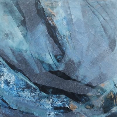 Collage of blue shredded pieces of paper.