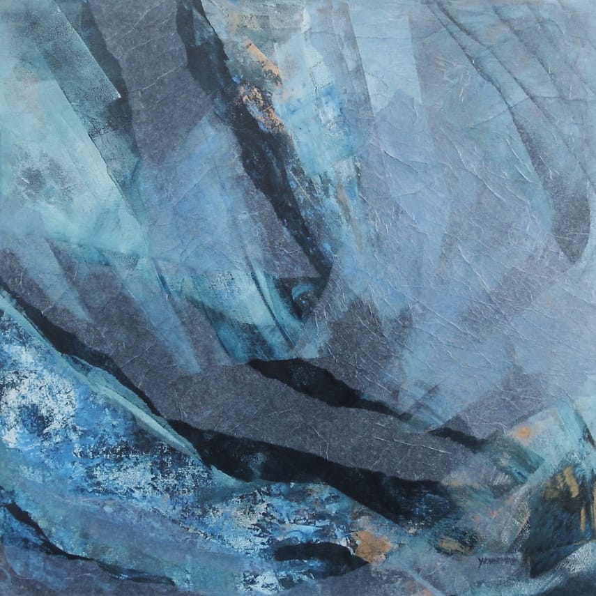 Collage of blue shredded pieces of paper.