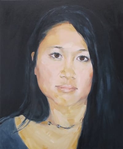 Young Asian woman with long black hair