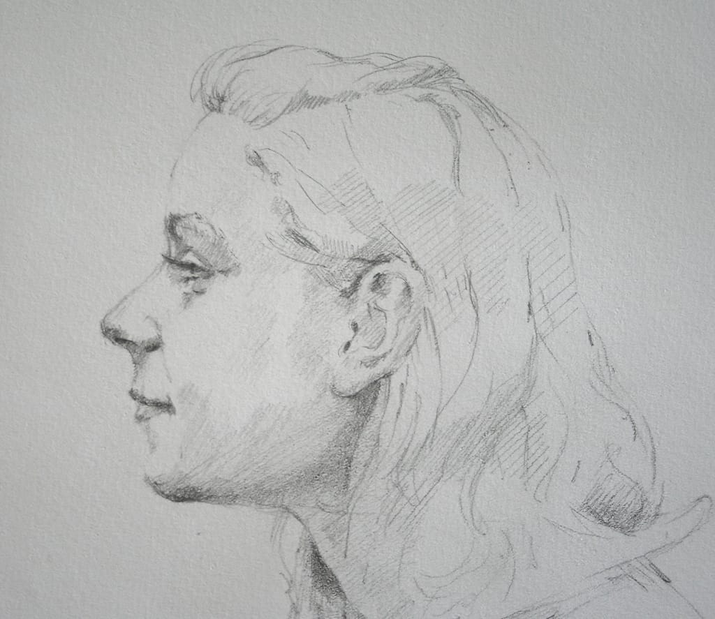 Portraitdrawing of a young woman with flowing hair, seen from the side.
